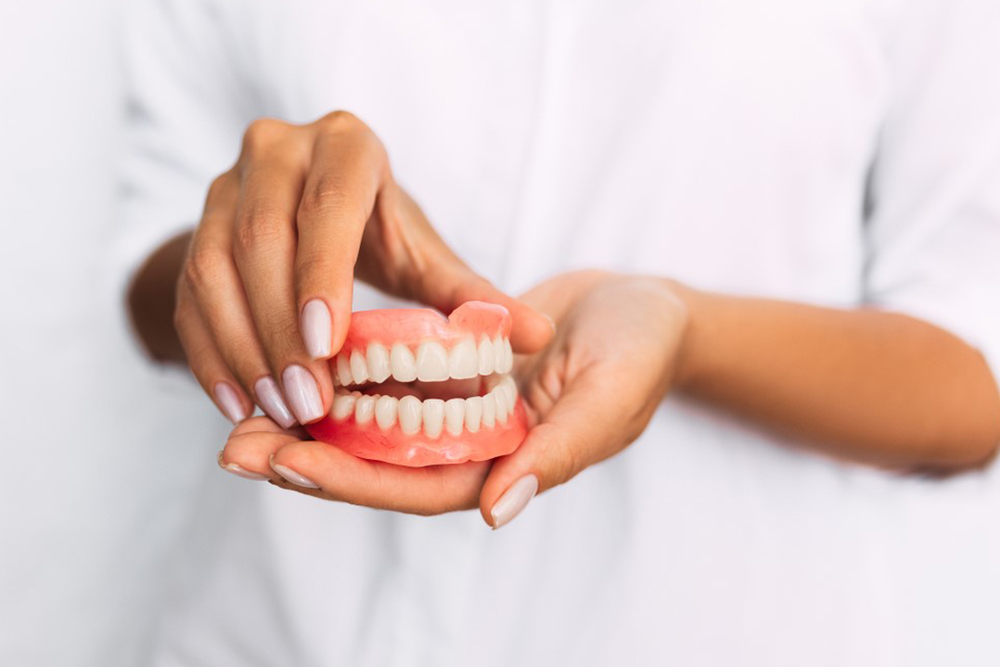 Patient being fitted for dentures at St. Jacobs Dental Care by dentist in St. Jacobs in a clinical setting